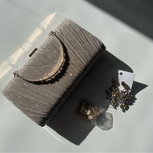Elegant Silver Clutch Bag with Matching Earrings